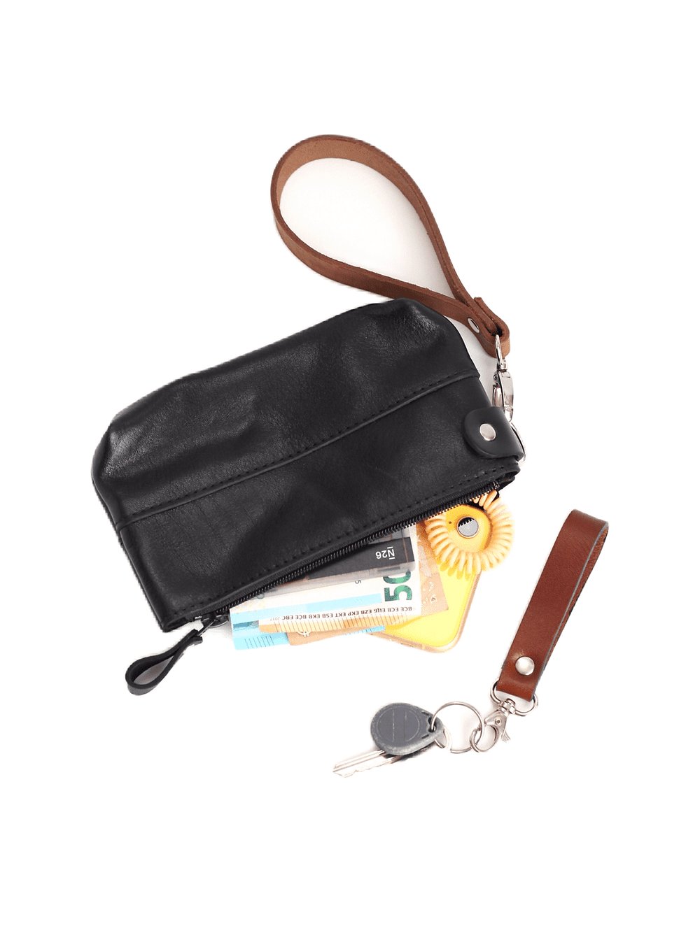 2. Black POUCH wallet by TOKS VISOKS with items inside, featuring removable brown wrist strap and secure zipper