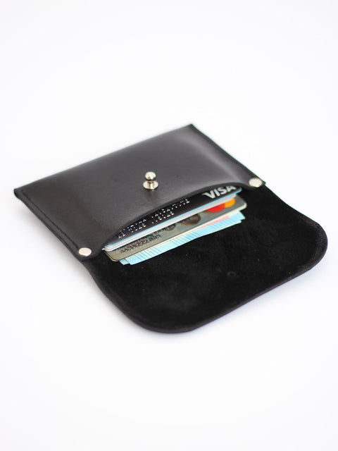 2. Black recycled leather WEEKEND Wallet by TOKS VISOKS displayed open with cards, angled view