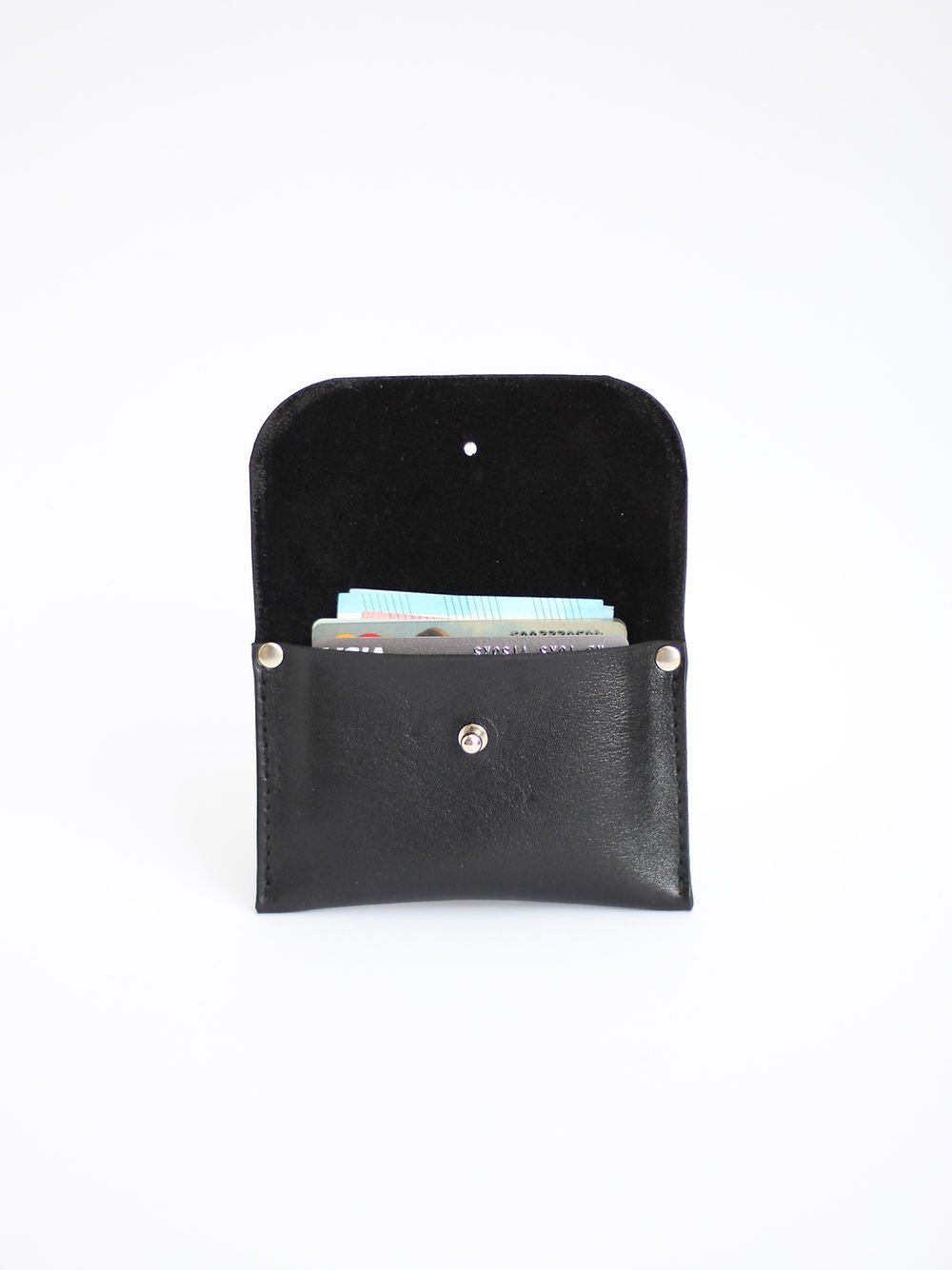 1. Black WEEKEND Wallet by TOKS VISOKS shown open with cards inside, made from recycled leather