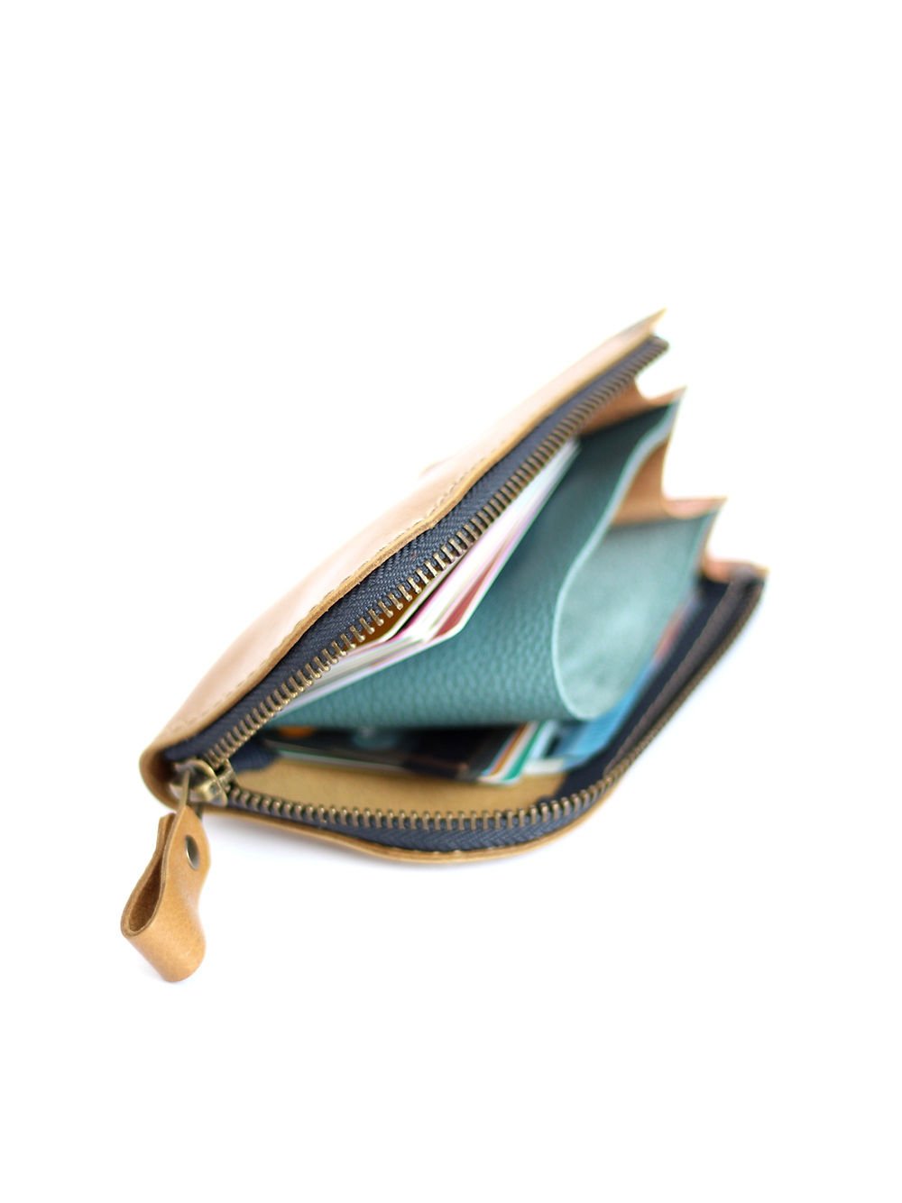 5. Partially open TOKS VISOKS WEDNESDAY Wallet in mustard, showing card and coin storage