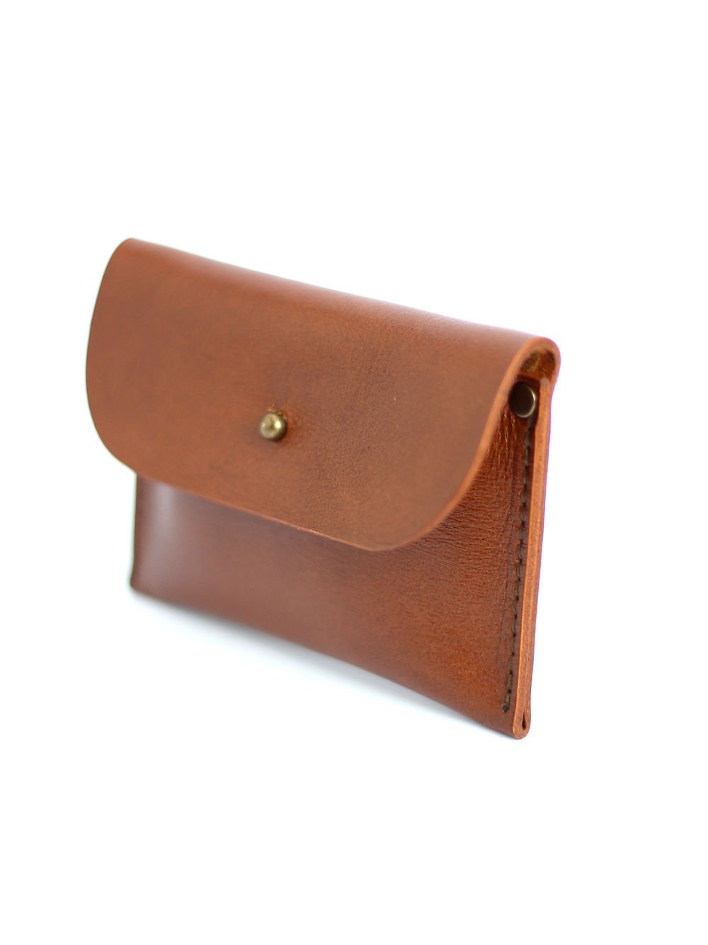 2. Side view of TOKS VISOKS WEEKEND Wallet in Ginger, highlighting compact design and recycled leather