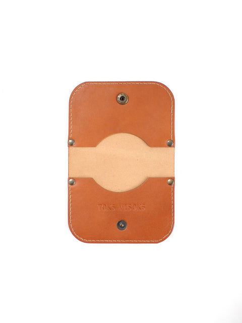 3. Flat lay of open SUNDAY Wallet in caramel by TOKS VISOKS, showing interior layout