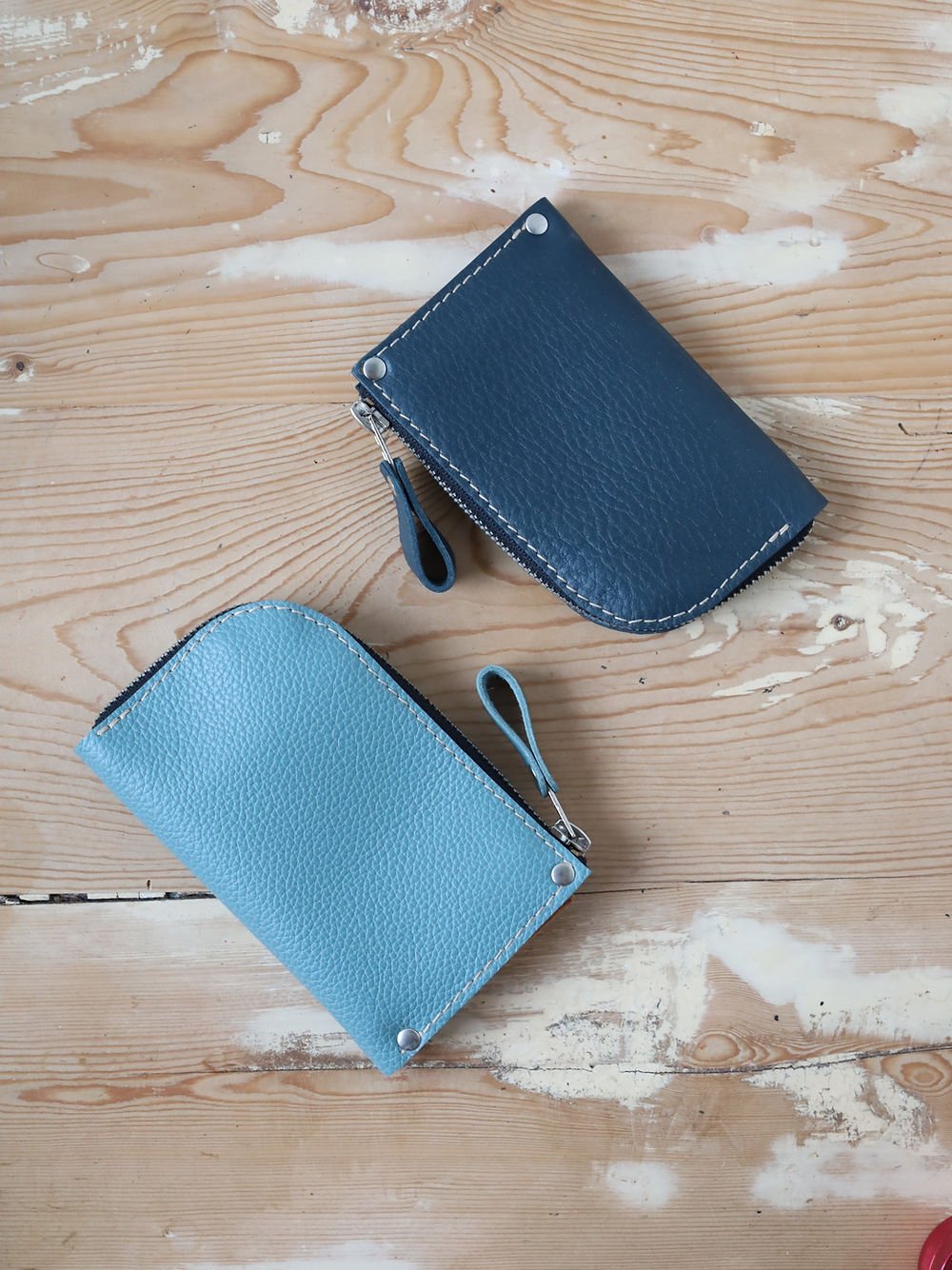 5. Flat lay of two WEDNESDAY Wallets by TOKS VISOKS in blue and light blue
