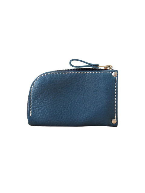 3. Studio shot of blue WEDNESDAY Wallet by TOKS VISOKS with curved zipper design