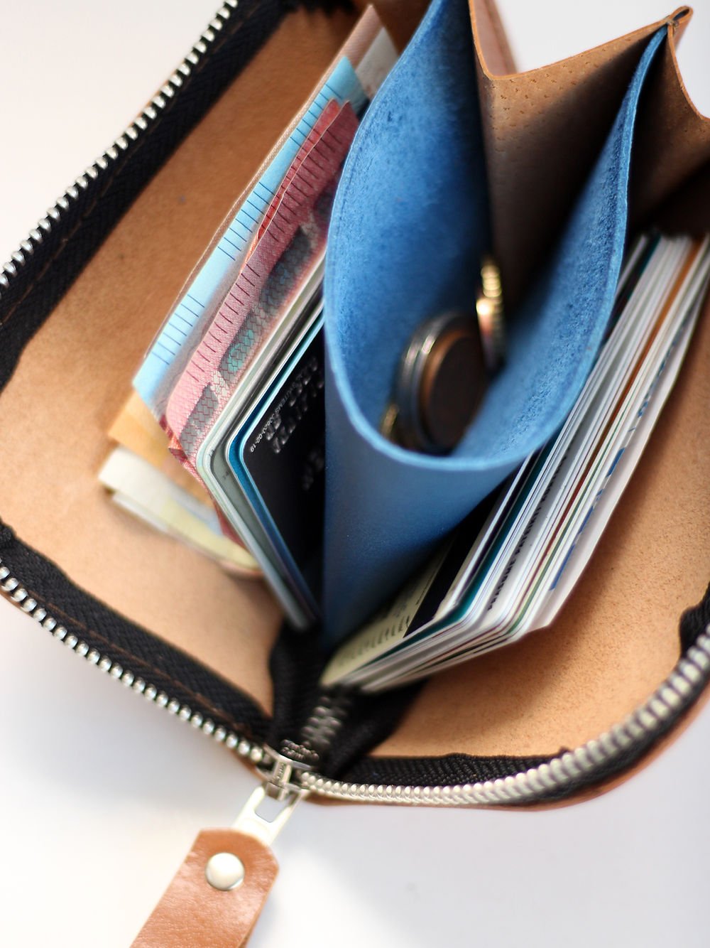 2. Inside view of caramel WEDNESDAY Wallet by TOKS VISOKS, displaying card slots and coin section