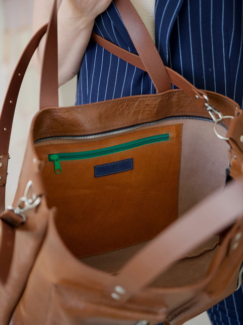 4. Interior view of TOKS VISOKS AMBER handbag showing secret zipped pocket and lining