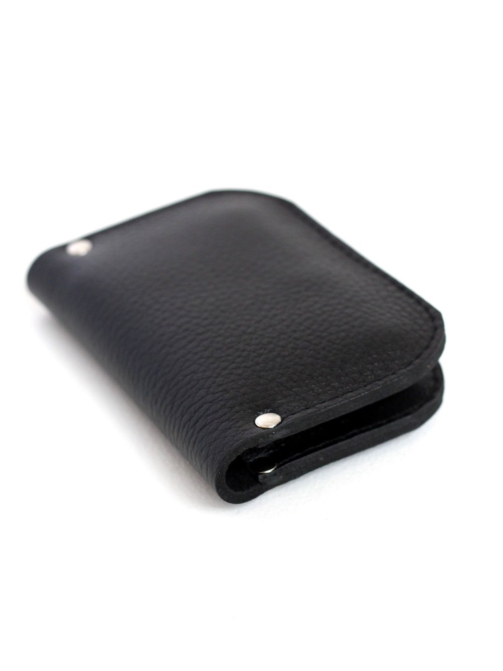 2. Black SUNDAY Wallet by TOKS VISOKS in studio, highlighting minimalist design and recycled leather