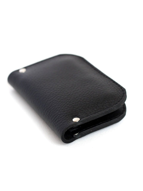 2. Black SUNDAY Wallet by TOKS VISOKS in studio, highlighting minimalist design and recycled leather