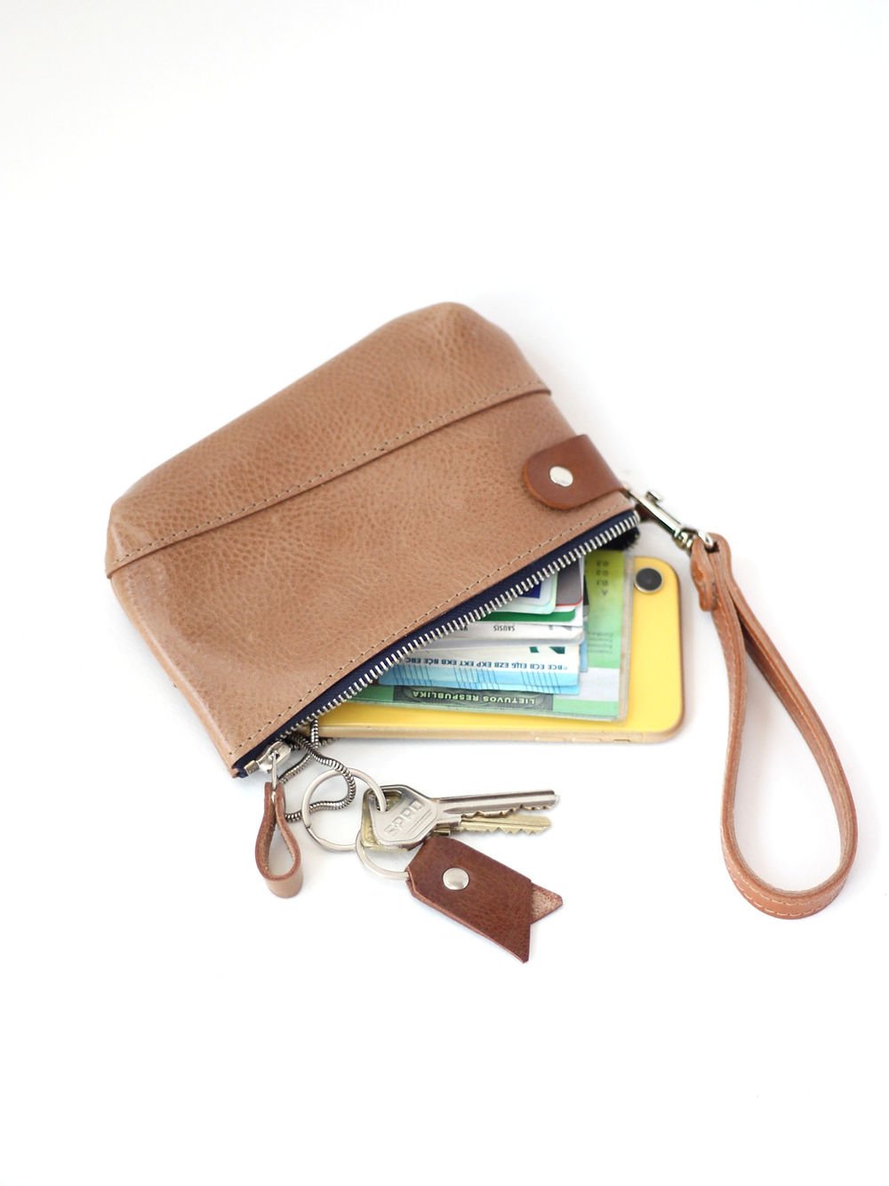 2. Brown leather POUCH Wallet by TOKS VISOKS with removable wrist strap, displaying contents