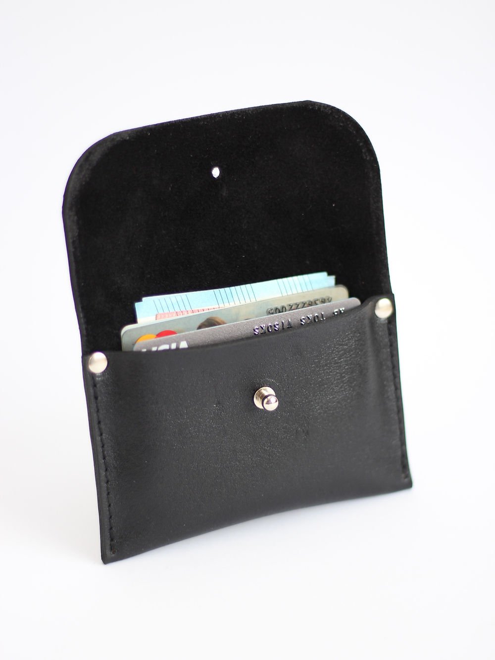 3. Open view of black WEEKEND Wallet by TOKS VISOKS with cards, highlighting recycled leather material