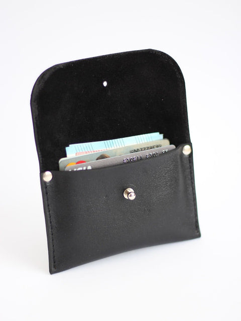 3. Open view of black WEEKEND Wallet by TOKS VISOKS with cards, highlighting recycled leather material