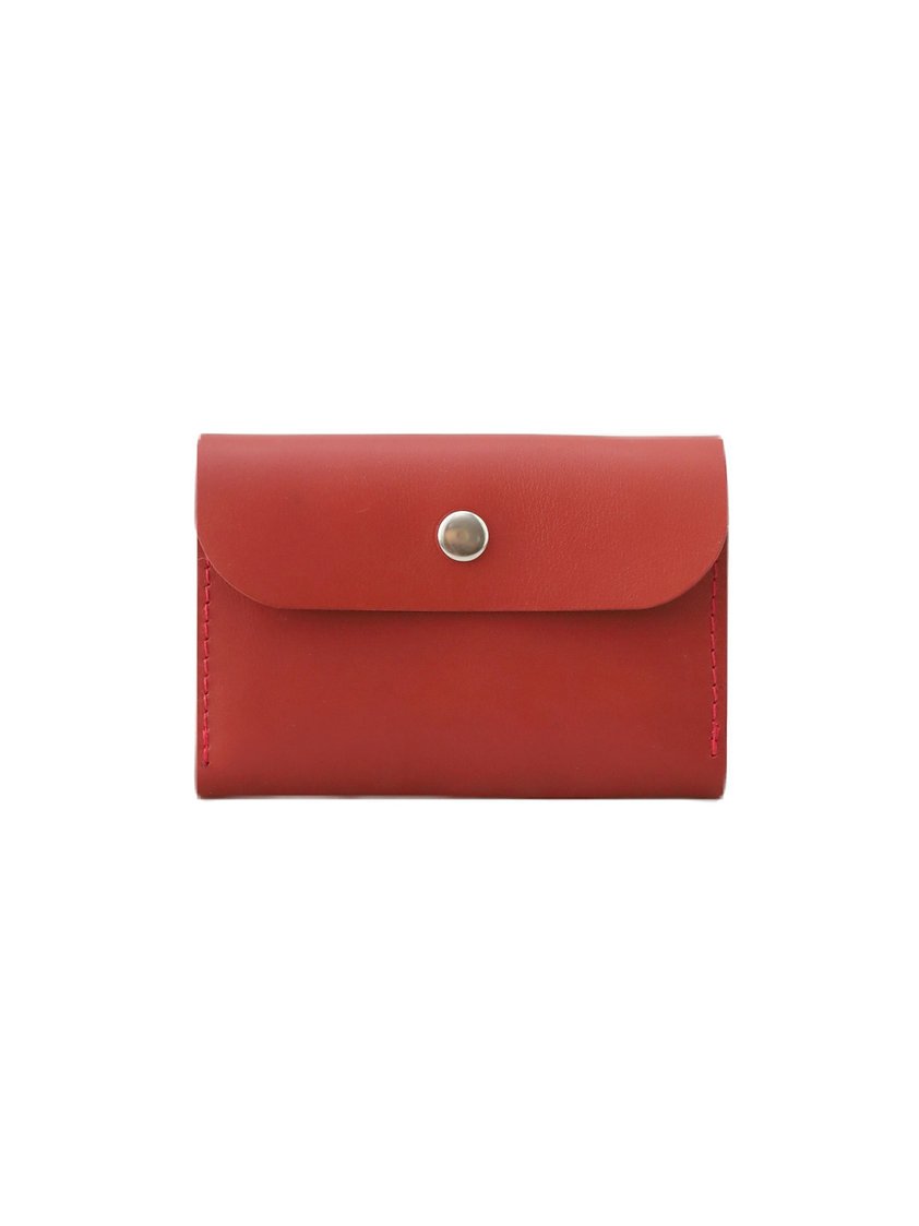 2. Studio shot of TOKS VISOKS FRIDAY Wallet in faded red, front view with button closure