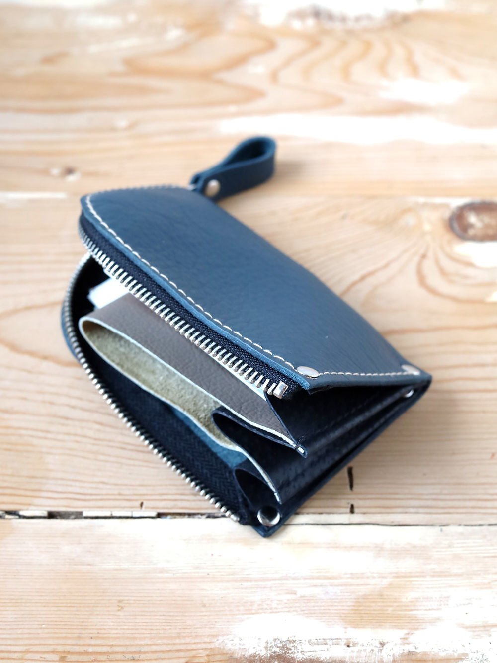 8. Open side view of blue WEDNESDAY Wallet by TOKS VISOKS showing interior compartments