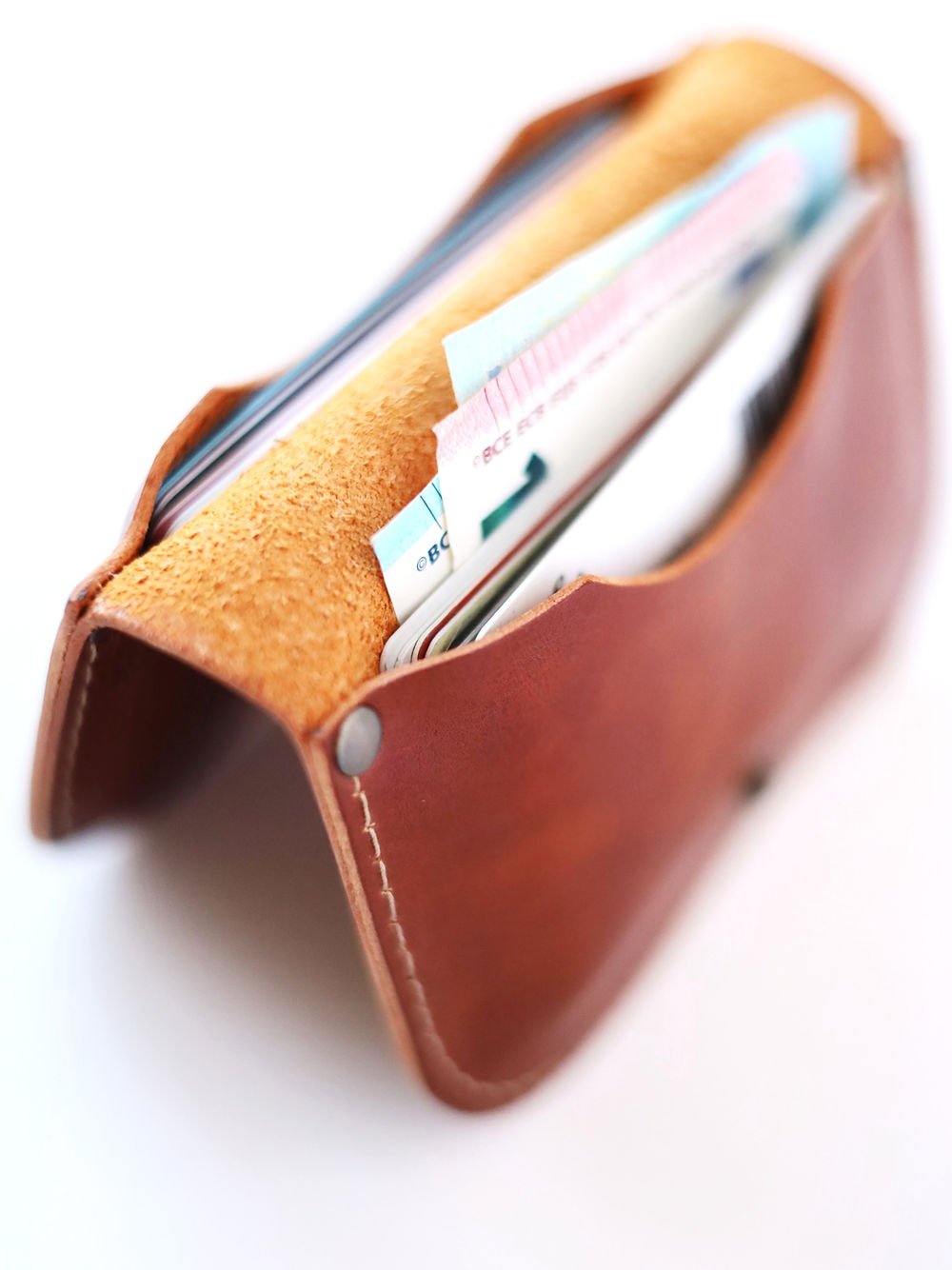 3. Side view of SUNDAY Wallet in Shiny Ginger by TOKS VISOKS, highlighting compact design and card storage