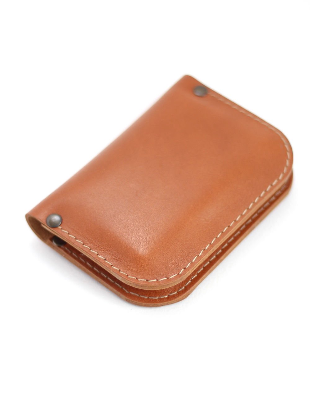 2. Closed SUNDAY Wallet in caramel by TOKS VISOKS, highlighting sleek design and stitching