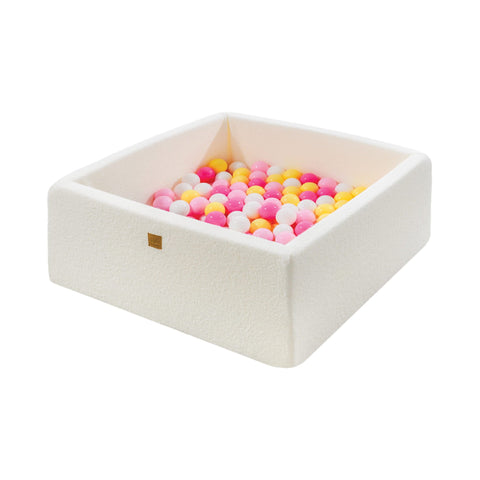 1. MeowBaby white boucle square ball pit filled with pink, white, and yellow balls, designed for toddlers, shown in a clean studio setting