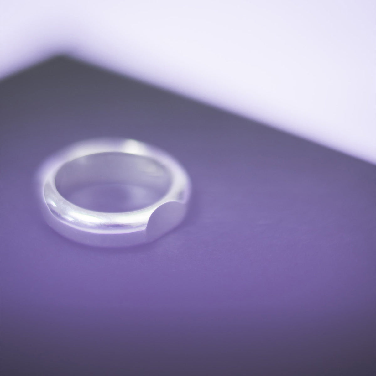 3. Close-up of Maarja Palu's Ring HOLLOW in silver on a purple background