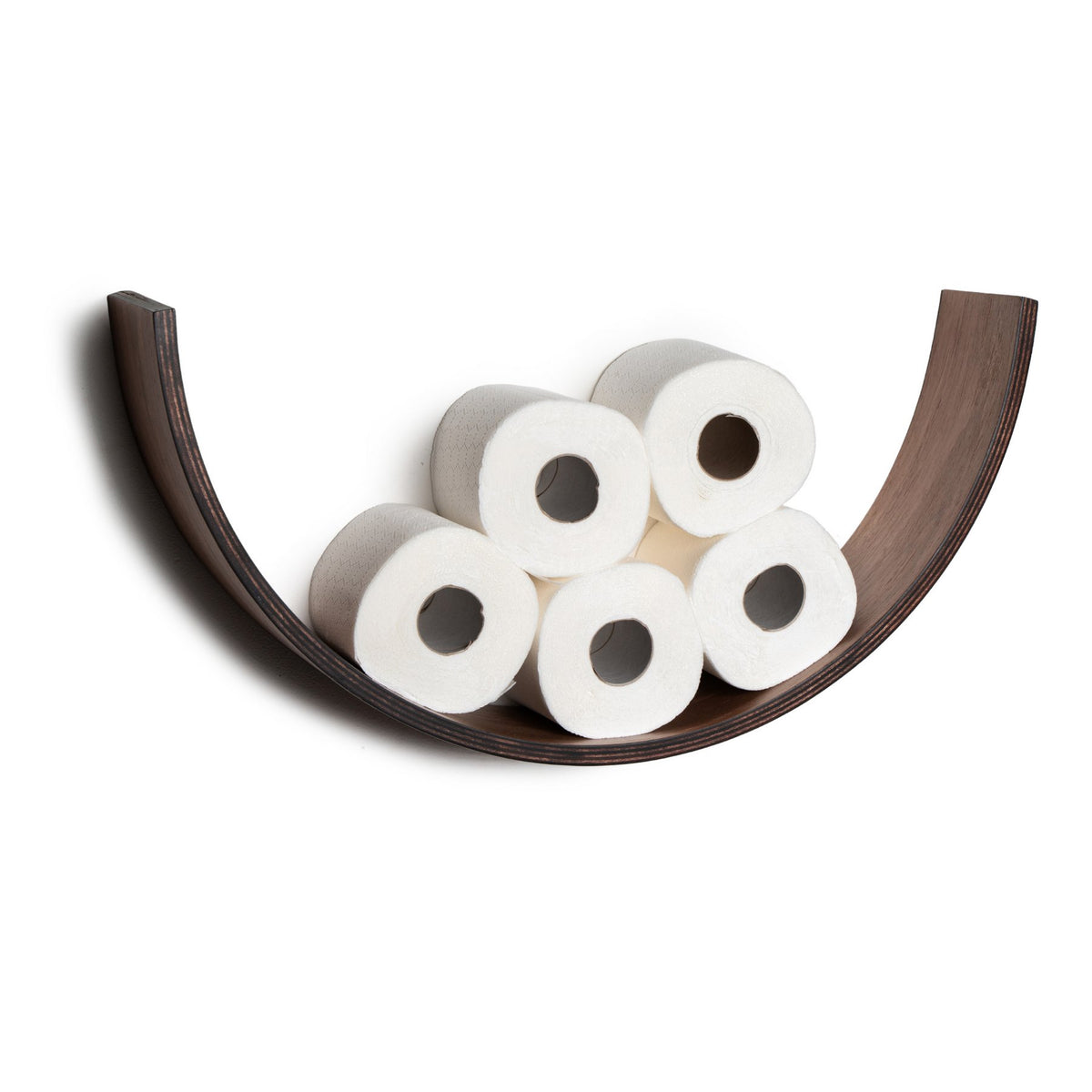 2. Studio shot of wooden toilet paper holder in smile shape holding five rolls, made from dark wood veneer