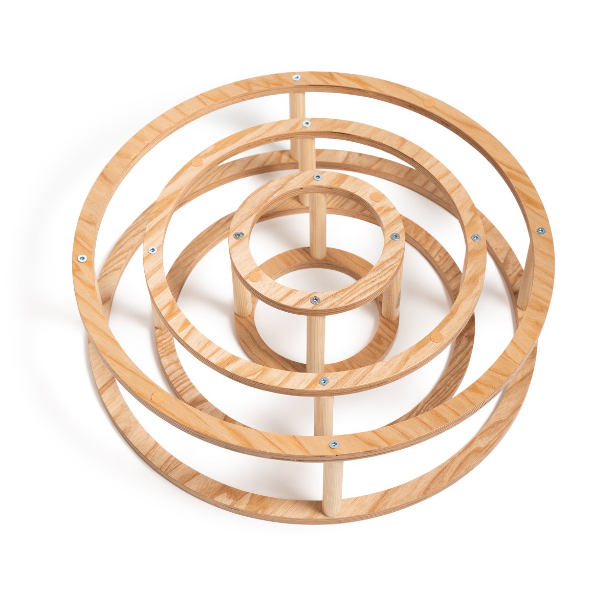 7. Top view of nested wooden rings with dowels, showcasing layered design
