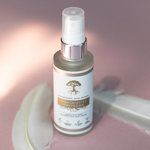 1. HOIA homespa deep moisturizing face toner in 50ml glass bottle with sprayer, shown on pink background with feather