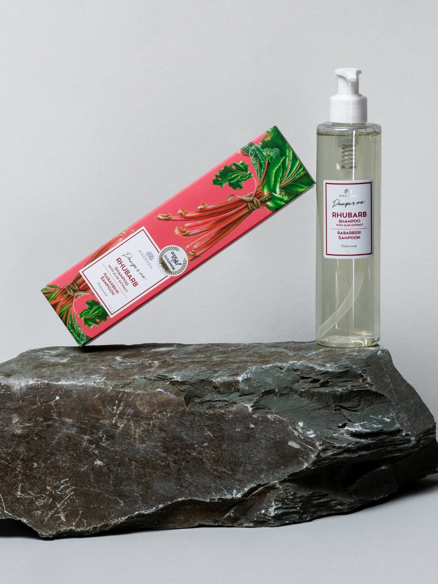 1. Magrada Organic Cosmetics Rhubarb Shampoo with Aloe Extract in 250 ml bottle and packaging, displayed on a rock