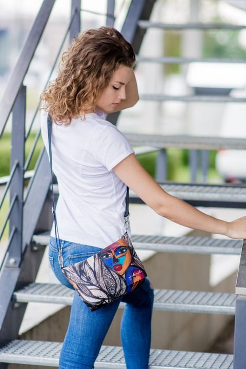 2. Women's shoulder bag with mermaid design by Dovilė Aleksonė, styled crossbody on stairs