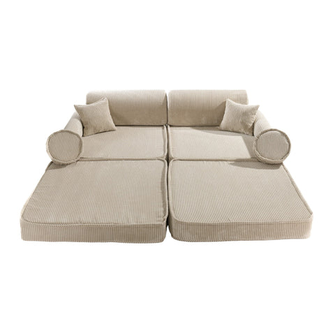 3. Top view of MeowBaby modular sofa in ecru corduroy, fully extended with cushions and armrests
