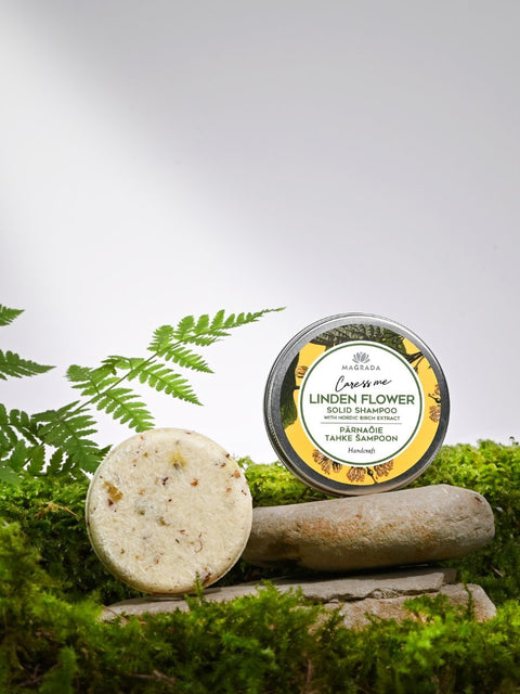 4. Collection of Magrada Organic Cosmetics Linden Flower products, including shampoo bar, liquid soap, and cream, displayed on stone