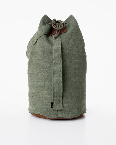 4. Studio shot of Trendbag Märss upcycled bag in light green, highlighting back view and strap detail