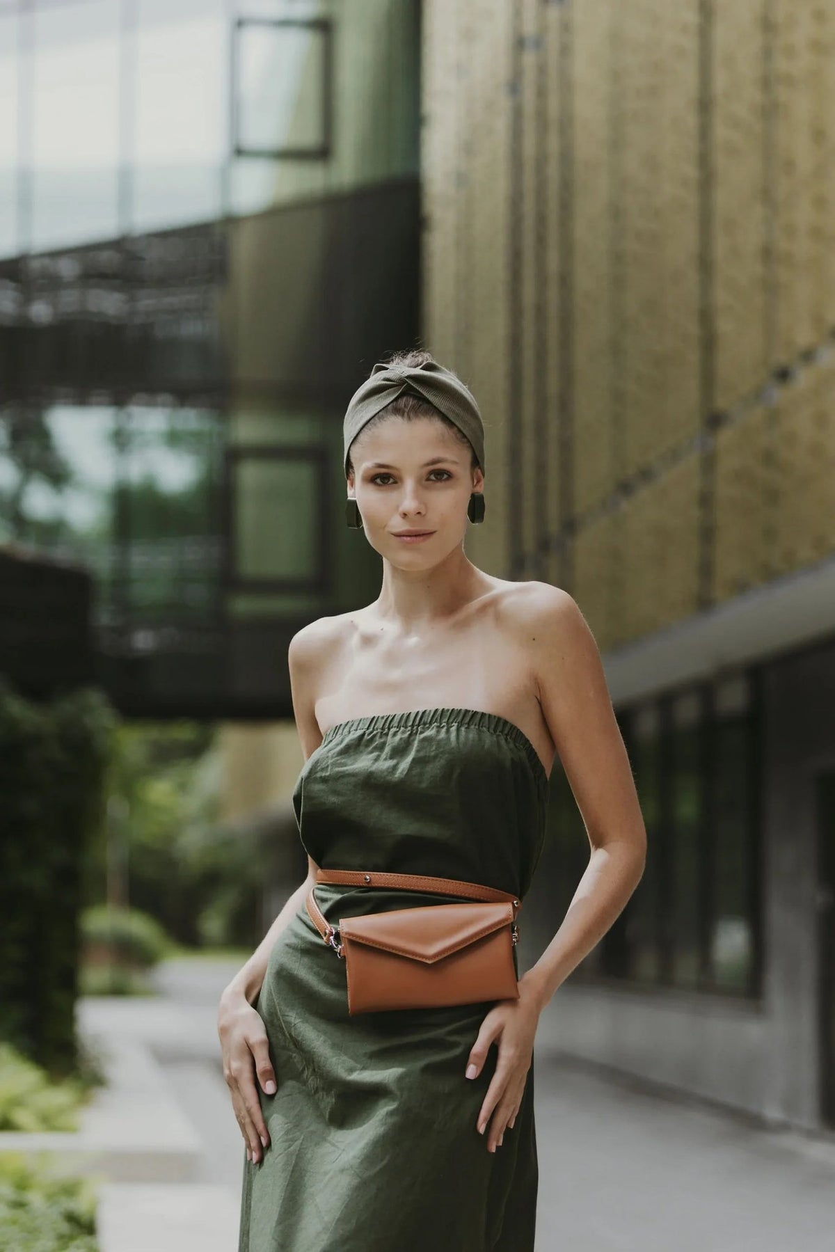 6. Women's pink leather waist and shoulder bag by Gerda Retter Design, styled with white blouse