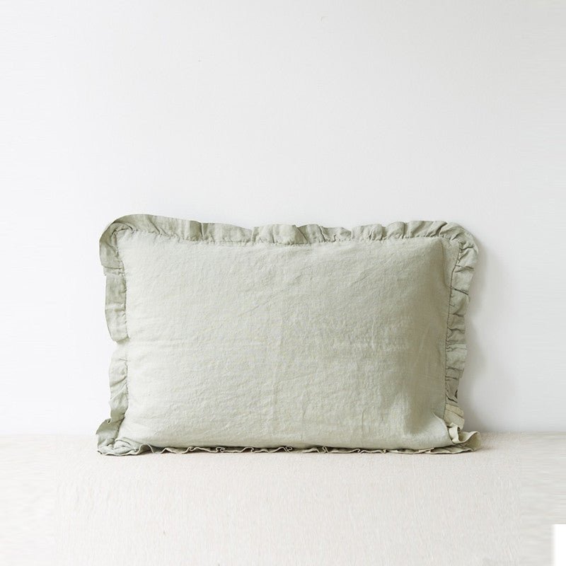 8. Light green linen pillowcase with frills on a neutral background, simple and elegant design