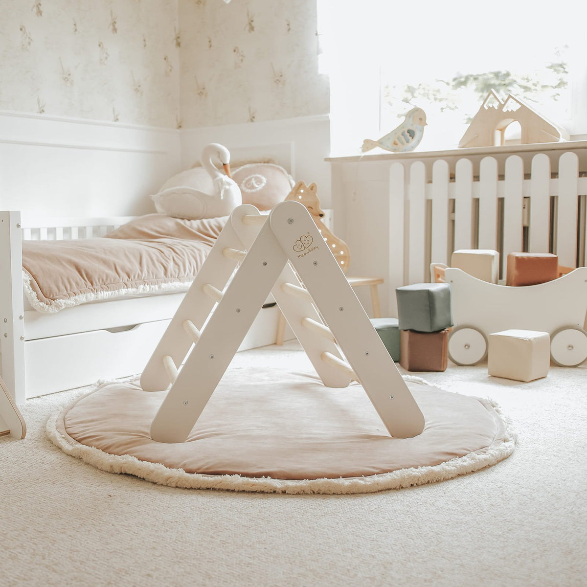 1. White wooden ladder in a child's room with natural light and wooden toys