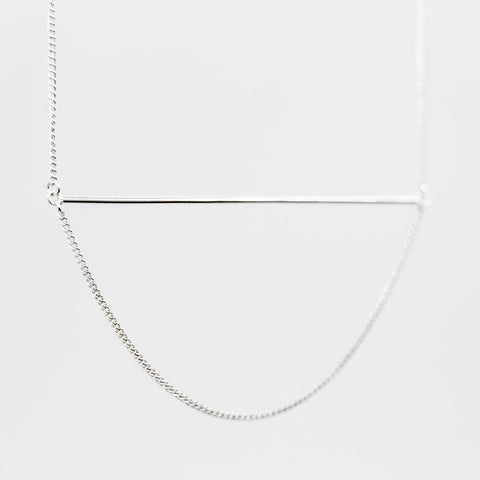 2. Close-up of Maarja Palu Necklace SWING in silver with horizontal bar and delicate chain