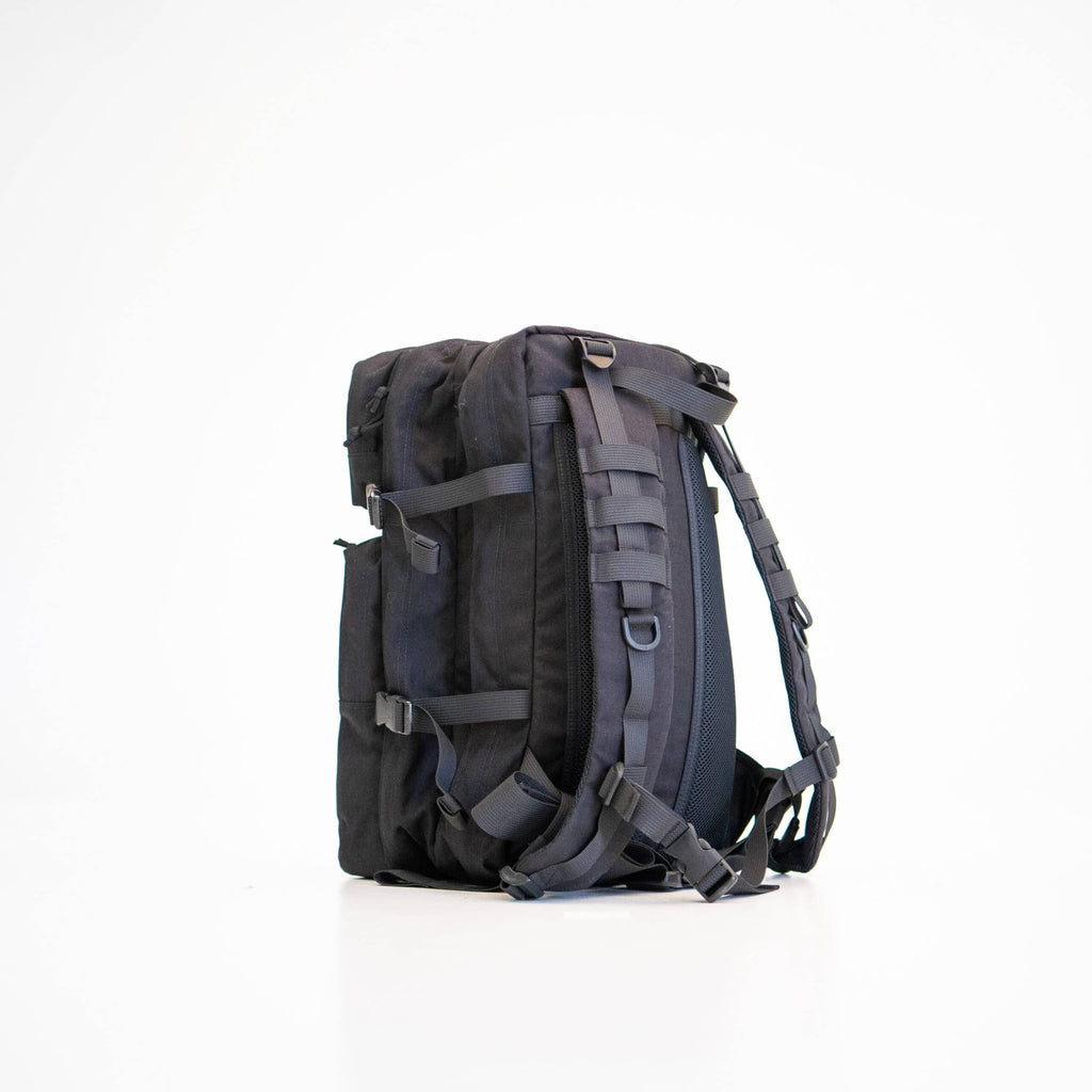 2. Side view of Galvi Linda Backpack 063 in black, showing ergonomic shoulder straps and compression straps