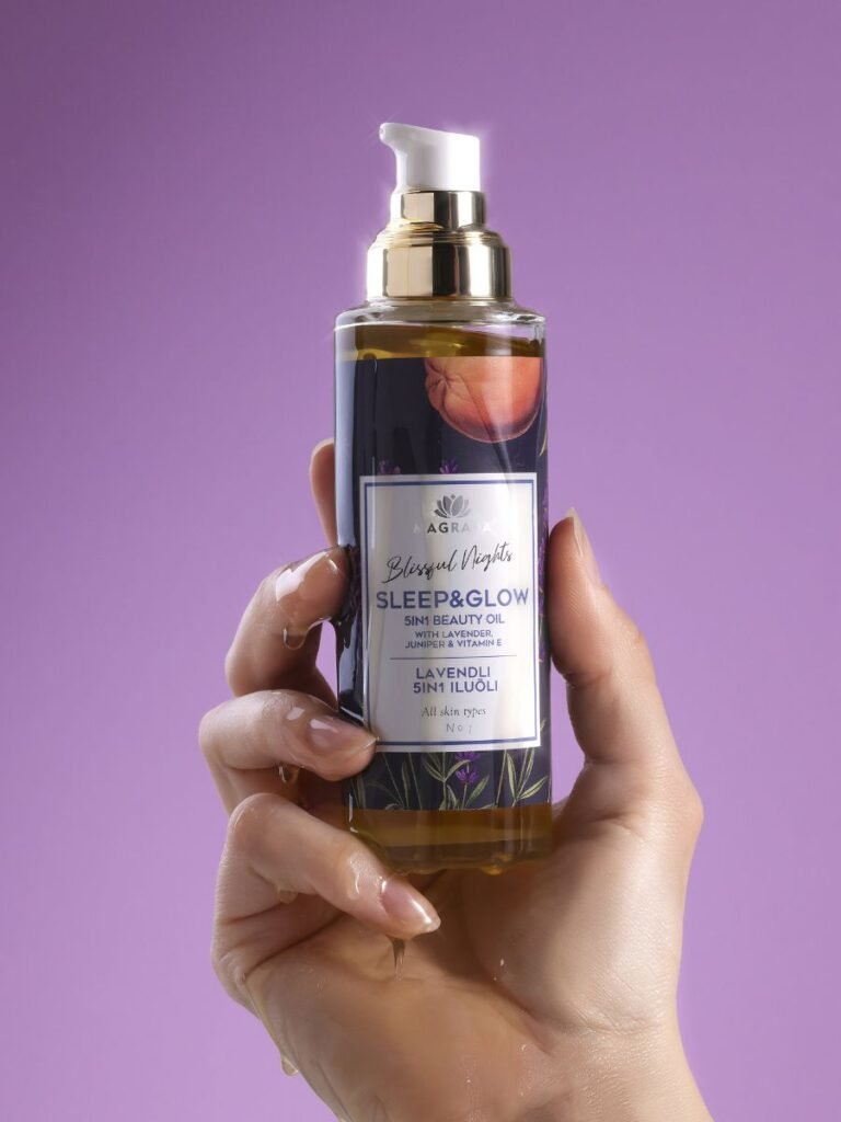 5. Hand holding Magrada Organic Cosmetics Lavender Body Oil with Vitamin E against purple background, studio shot