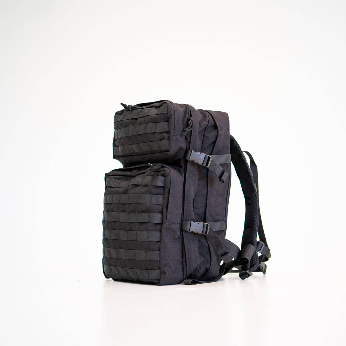 1. Galvi Linda Backpack 063 in black, featuring two large compartments and Molle system, studio setting