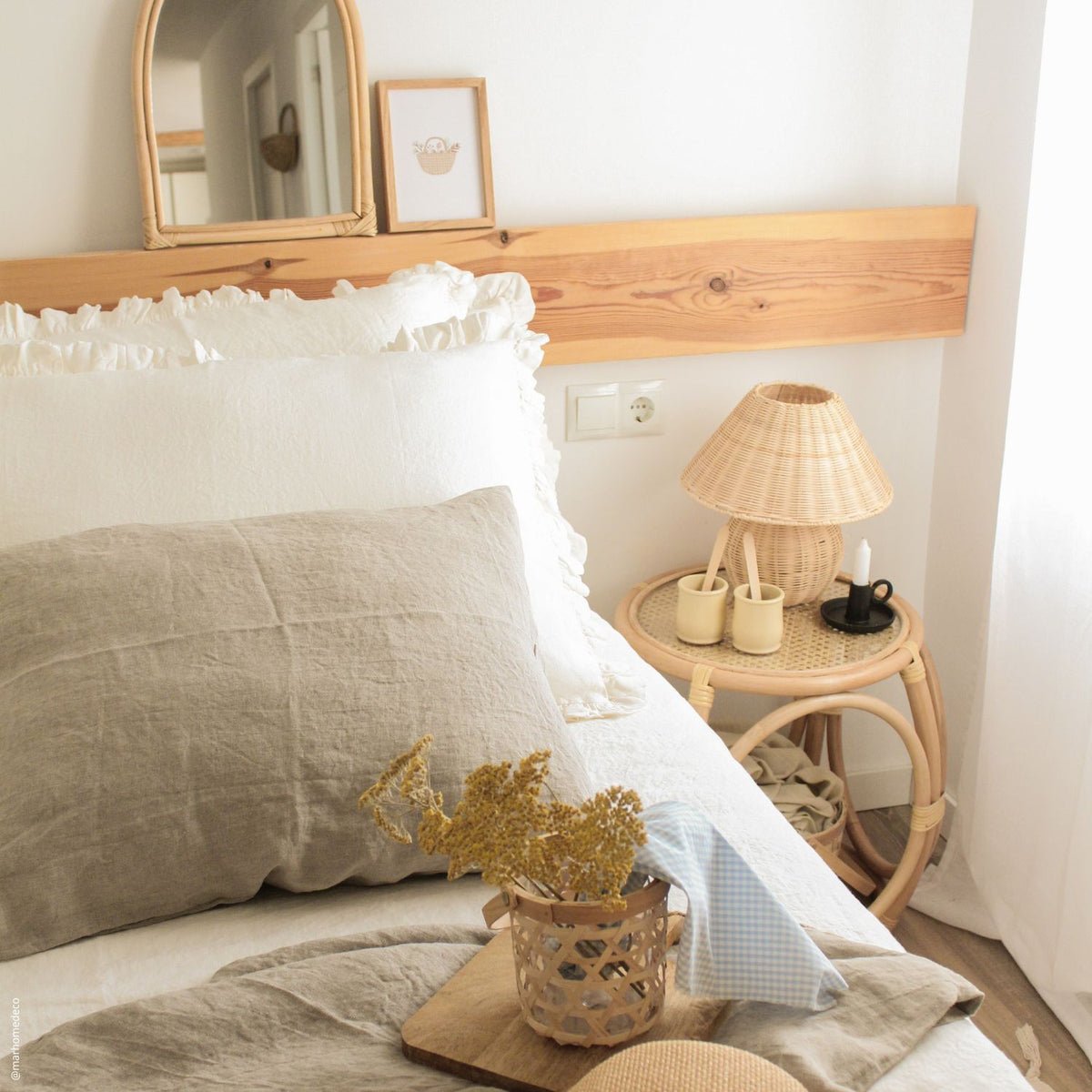 7. Beige and white frilled linen pillowcases on a bed with wooden headboard, cozy bedroom decor