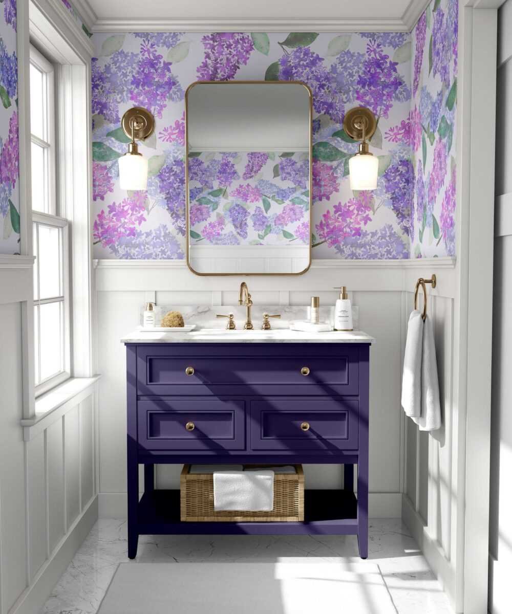 3. Bathroom interior with lilac garden wallpaper in light purple, featuring a purple vanity and gold fixtures