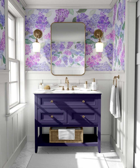 3. Bathroom interior with lilac garden wallpaper in light purple, featuring a purple vanity and gold fixtures