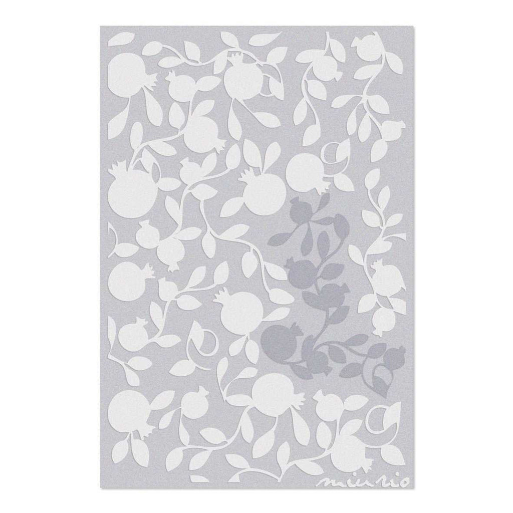 4. Flat lay of pomegranate branch rug in beige and grey on a light background with Miurio logo