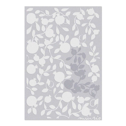 4. Flat lay of pomegranate branch rug in beige and grey on a light background with Miurio logo