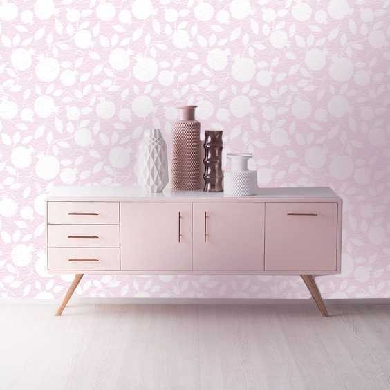 4. Pomegranate pink wallpaper with mid-century modern sideboard and decorative vases
