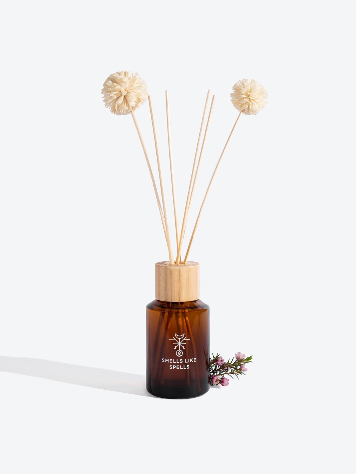 2. Smells Like Spells Home Perfume DELLINGR with diffuser sticks and floral accent, studio setting