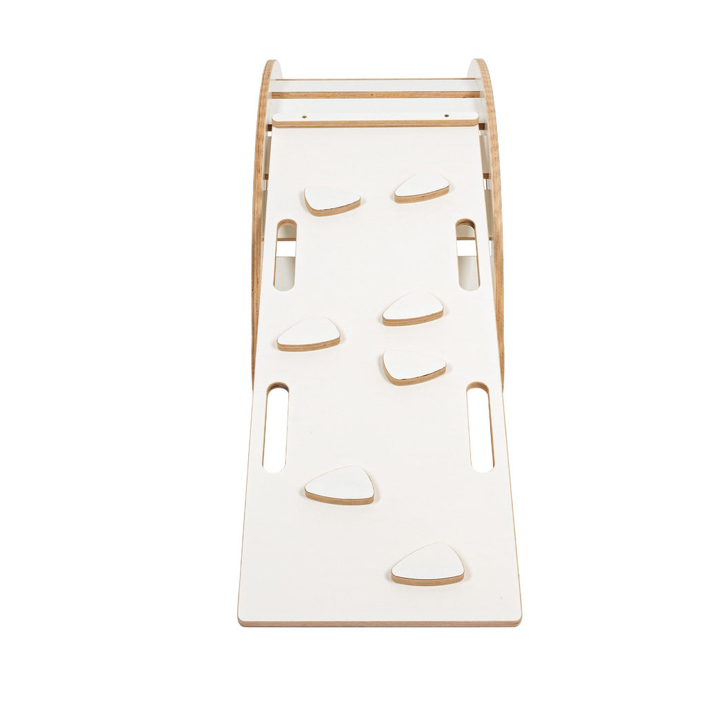 2. White slide with climbing holds attached to wooden dream rocker