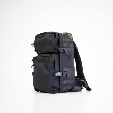 2. Studio shot of Galvi Linda Backpack 039 in black, side view highlighting front pockets and compression straps