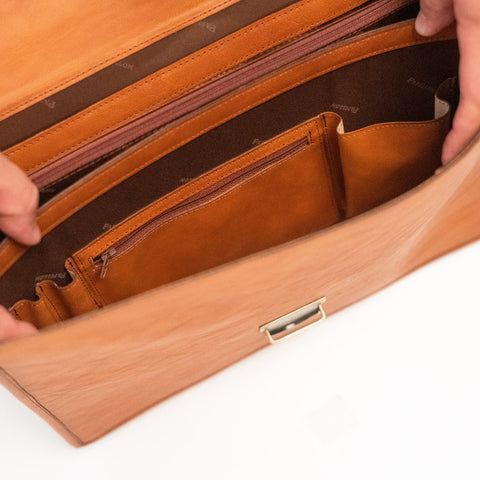 4. Close-up of interior compartments of Papillon Leather Briefcase No. 99, showing organized storage