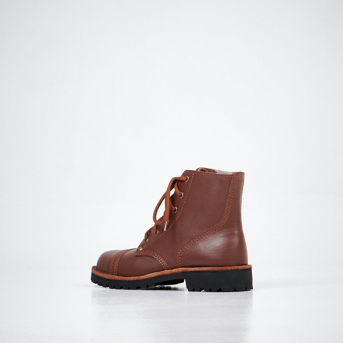 1. Aipi A-PS-2 brown leather boots with lace-up closure, side view in studio setting