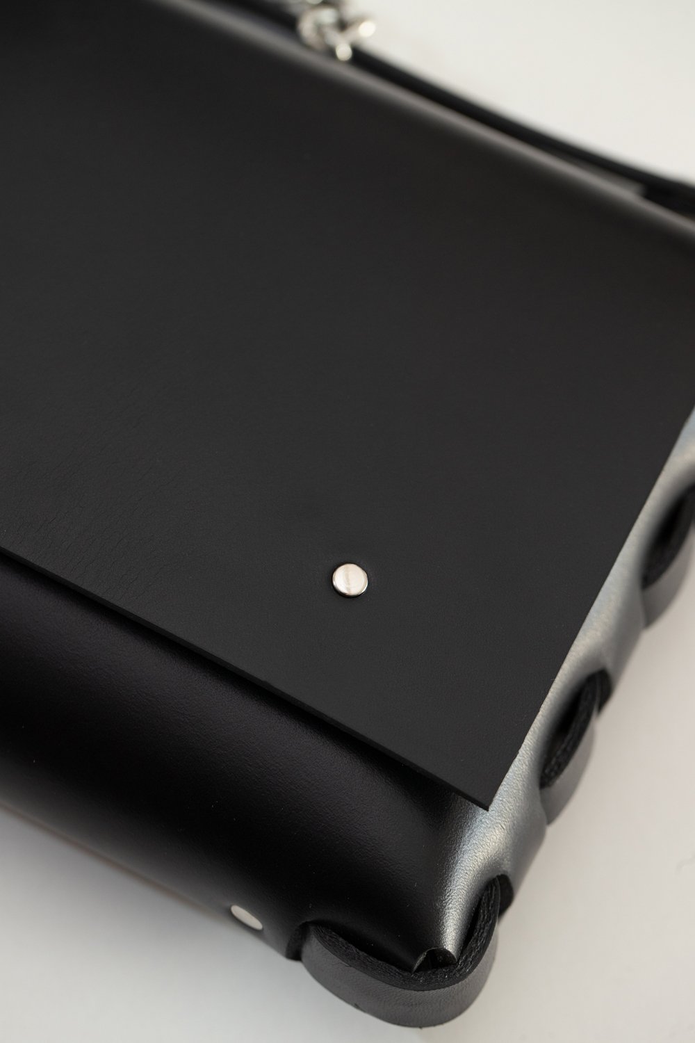 6. Close-up of PYKOK Agatha no.3 handbag highlighting premium natural leather and metal details