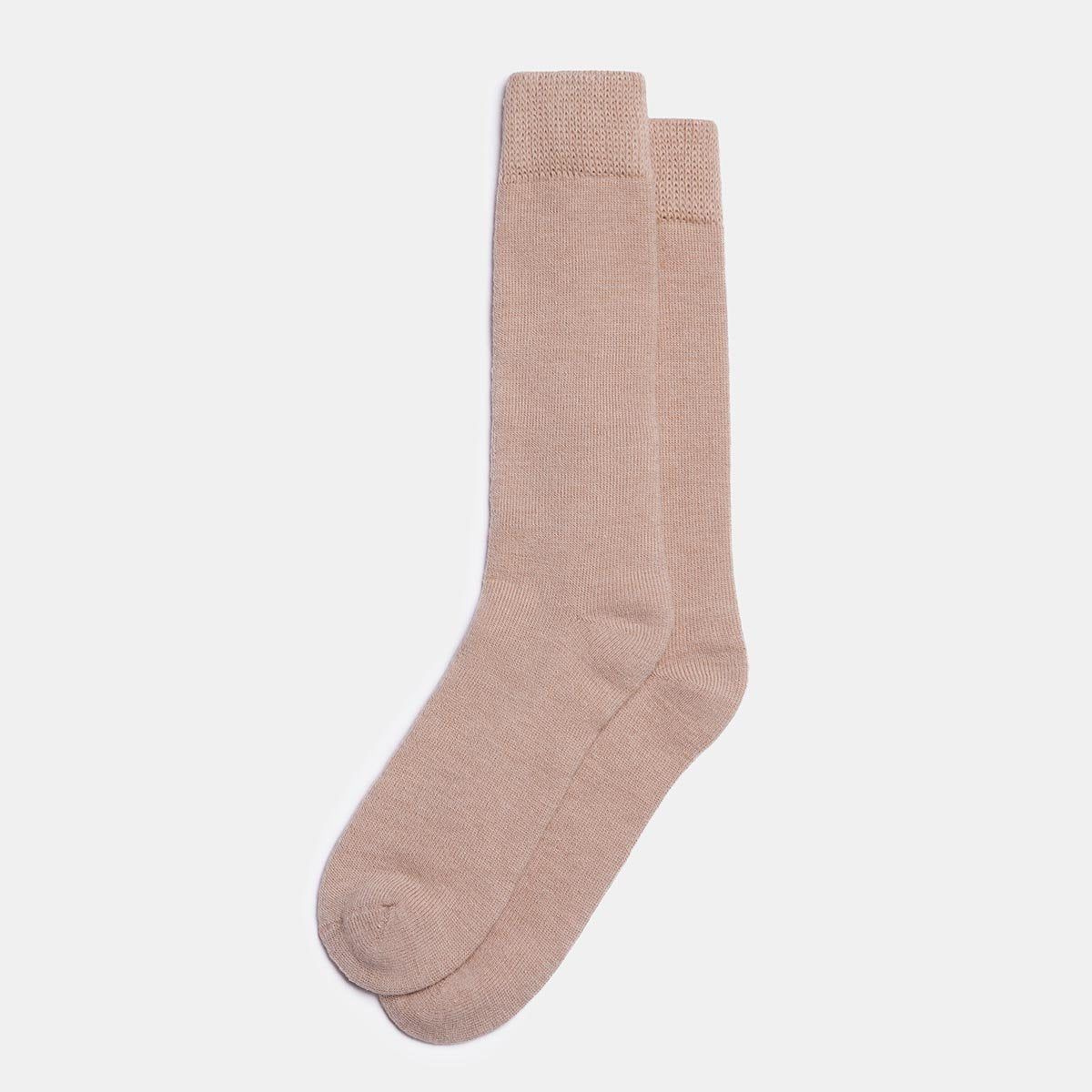 2. Unisex beige Alpaka natural alpaca wool socks in studio setting, highlighting thick knit and durable design