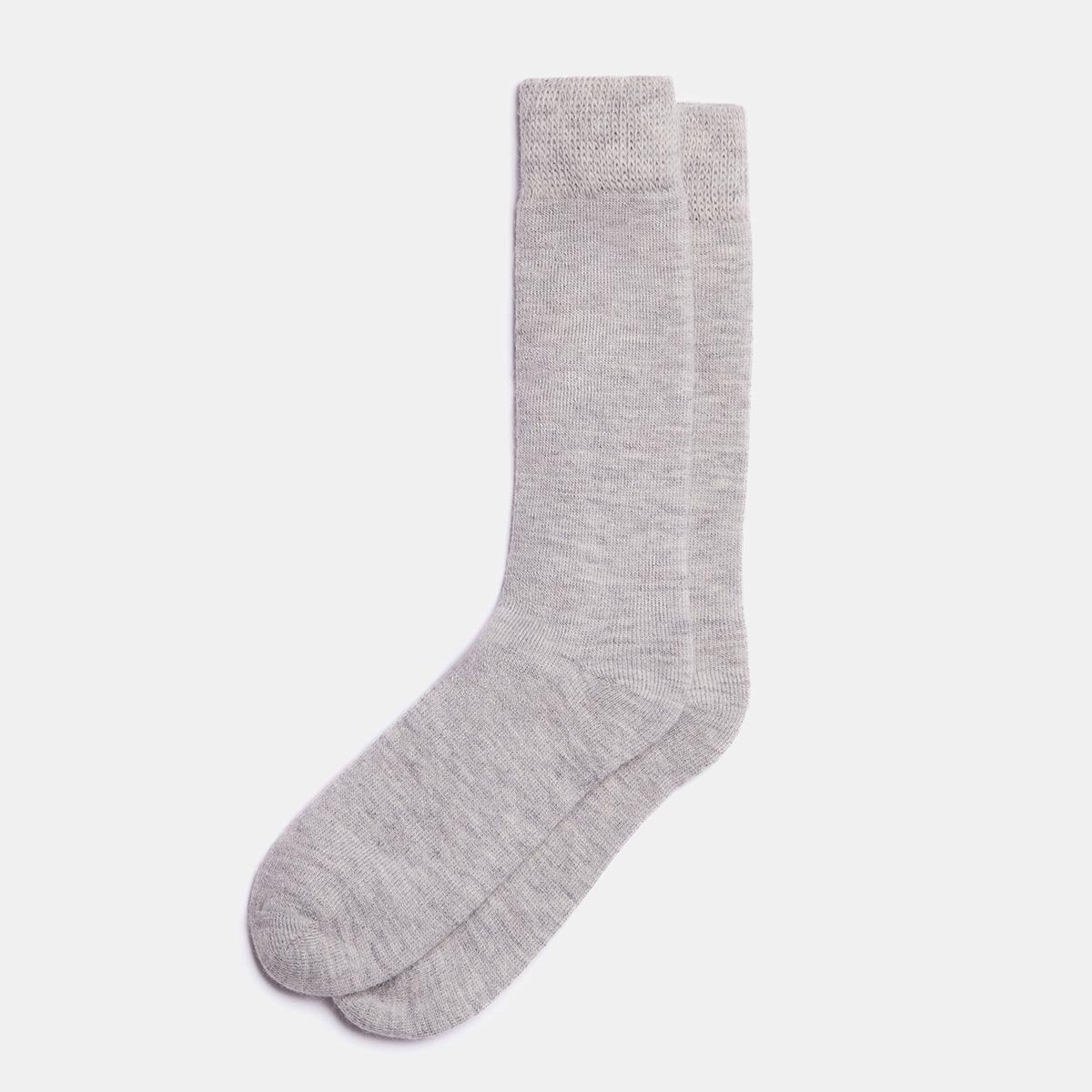 1. Unisex silver Alpaka natural alpaca wool socks in studio setting, showcasing fine knit and reinforced heel and toe